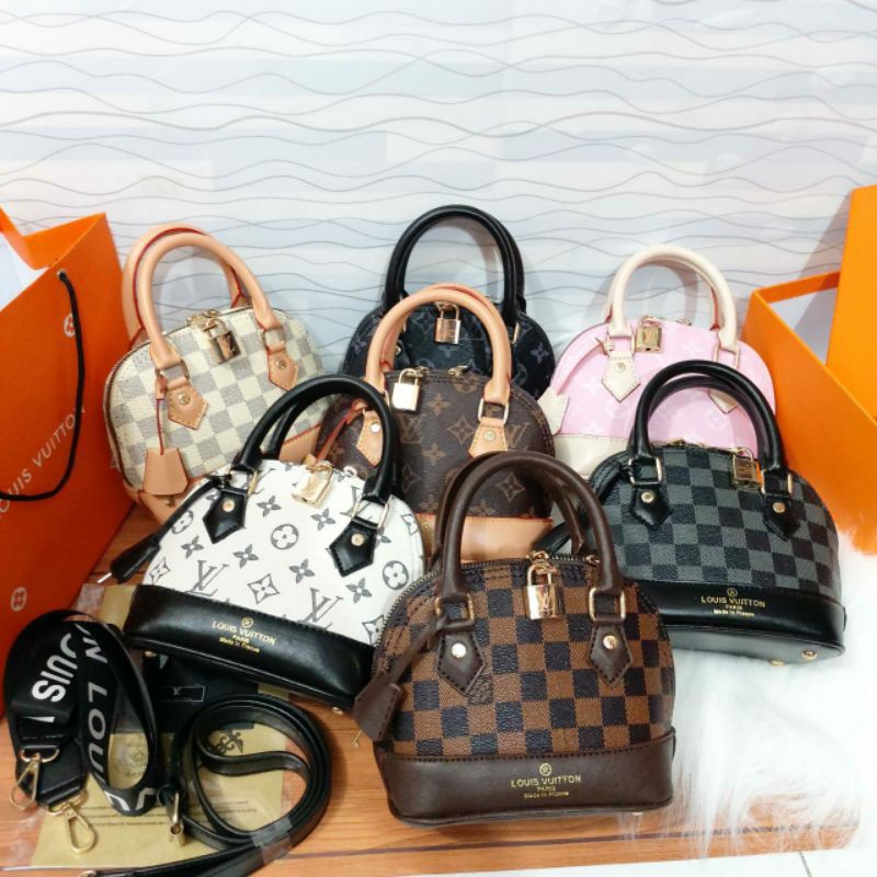 

TAS LV ALMA MINIFREE BOX. PAPERBAG. DUSTBAGKUNCI + GEMBOK MERK LV