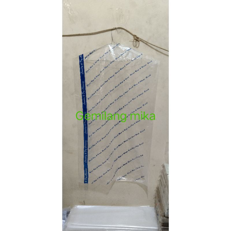 plastik laundry satuan lubang hanger 60 x 100cm printing( isi 10 lembar)