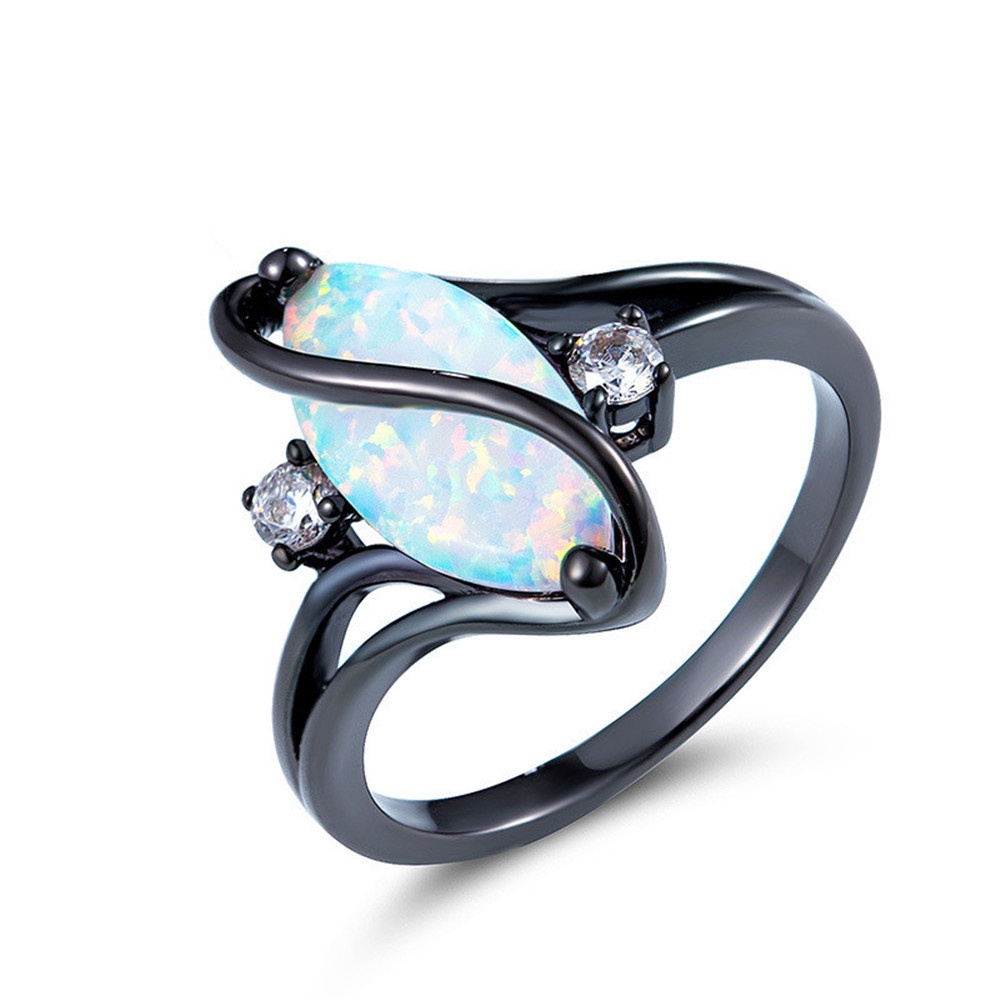 S-shaped diamond blue black gold horse eye opal ring