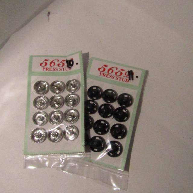 Kancing jepret besi besar
