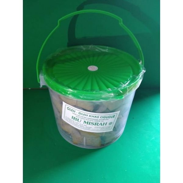 

Ibu Misrah Tape Ketan Bulat Hijau Asli Cigugur Bungkus Daun Jambu Kemasan Toples Plastik Isi 40