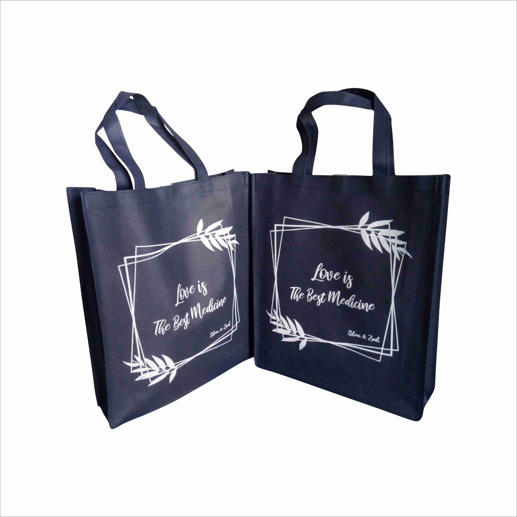 

Souvenir Pernikahan Unik Desain Simple Kain Spunbond Tebal 75gsm