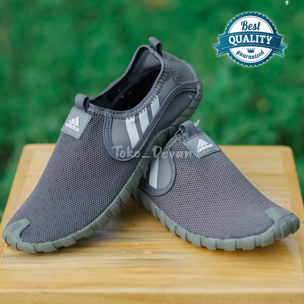 Sepatu slip on, sneaker pria wanita, adidas jawpaw