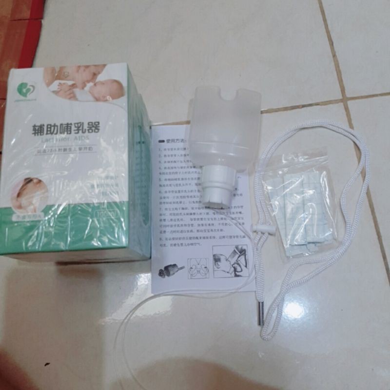 Lactation AIDS (alat bantu menyusui) SNS , alat bantu relaktasi menyusui suplemental nursing system