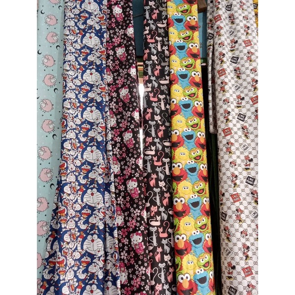 Bahan Kain Sprei Disperse Piyama Motif Karakter Kartun Anak Doraemon Katun Microtex Meteran Grosir