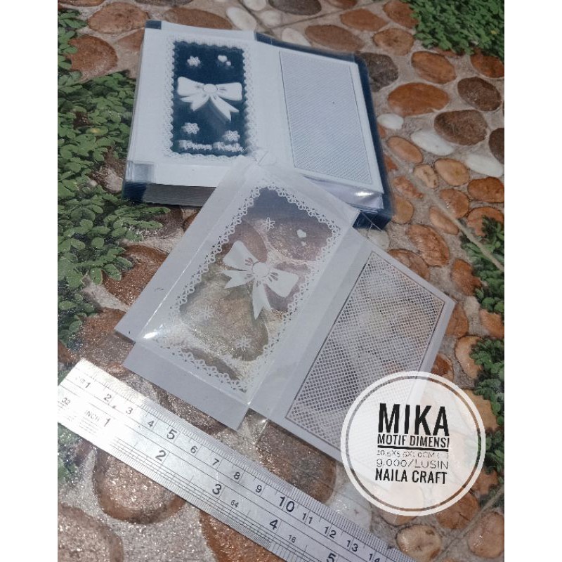 

Mika Souvenir Motif Persegi Panjang