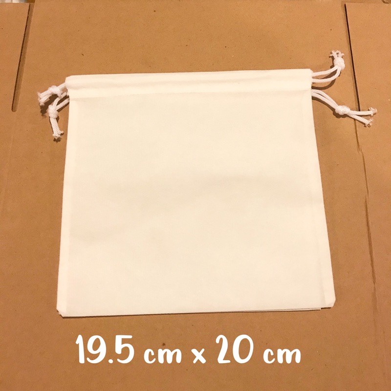 Dustbag Polos Spunbond Serut | Pelindung tas