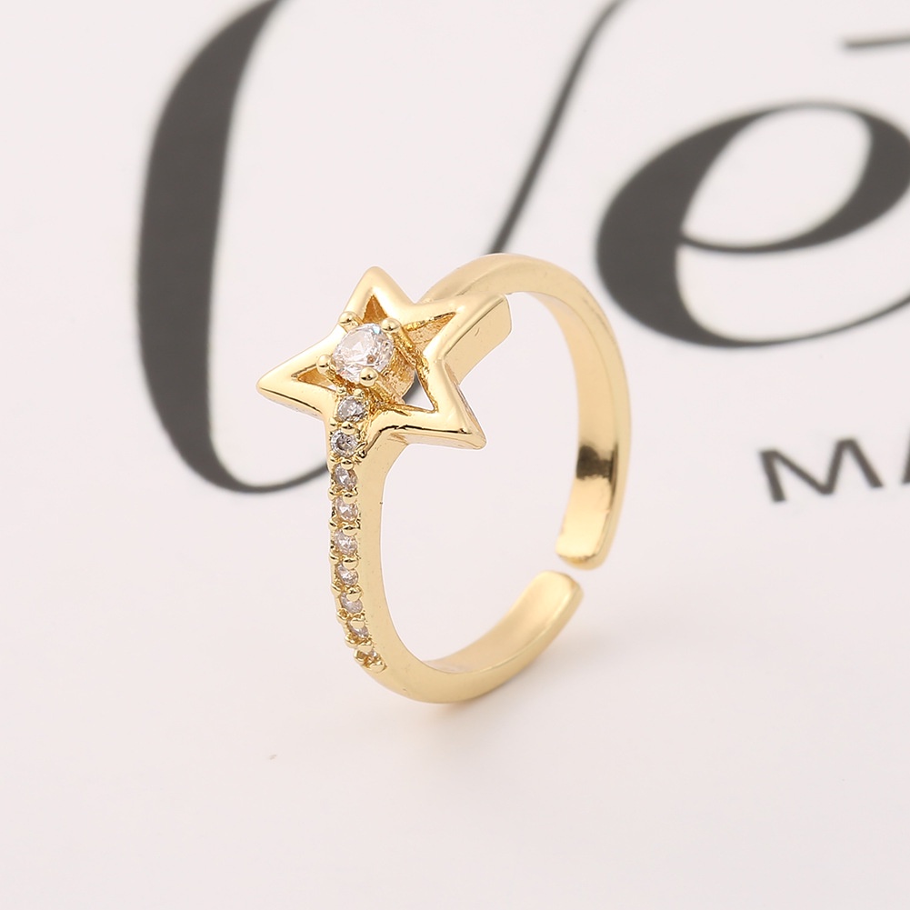 Cincin Eropa dan Amerika baru aksesoris tembaga zircon 18K emas lima menunjuk bintang bunga rhinesto