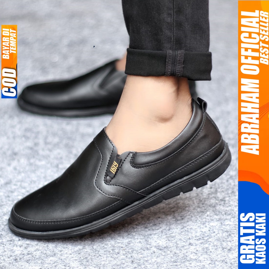 Sepatu Slip on Pria Santai Casual Formal Kulit Syntetic Kerja Kantor Kuliah Kondangan Hitam Keren Terbaru