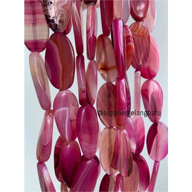 batu alam Penden simba oval pink carnelian 2 x 4 cm warna merah muda