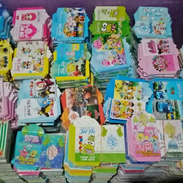 

Paket 1kg dapat 800lembar amplop lebaran belum di lem free plastik