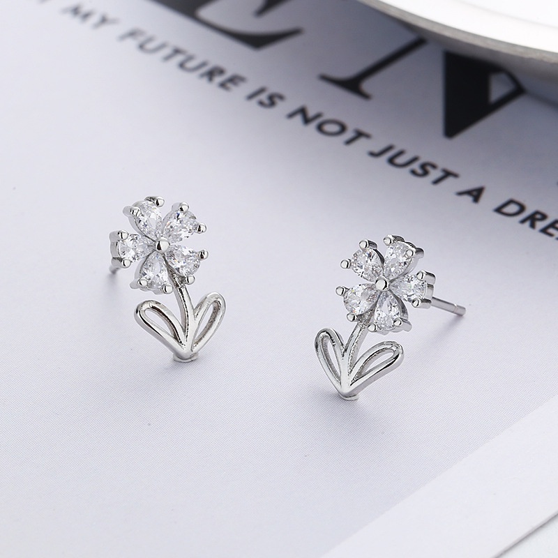 Anting Tusuk Bentuk Daun Hollow Aksen Batu Zircon Untuk Wanita