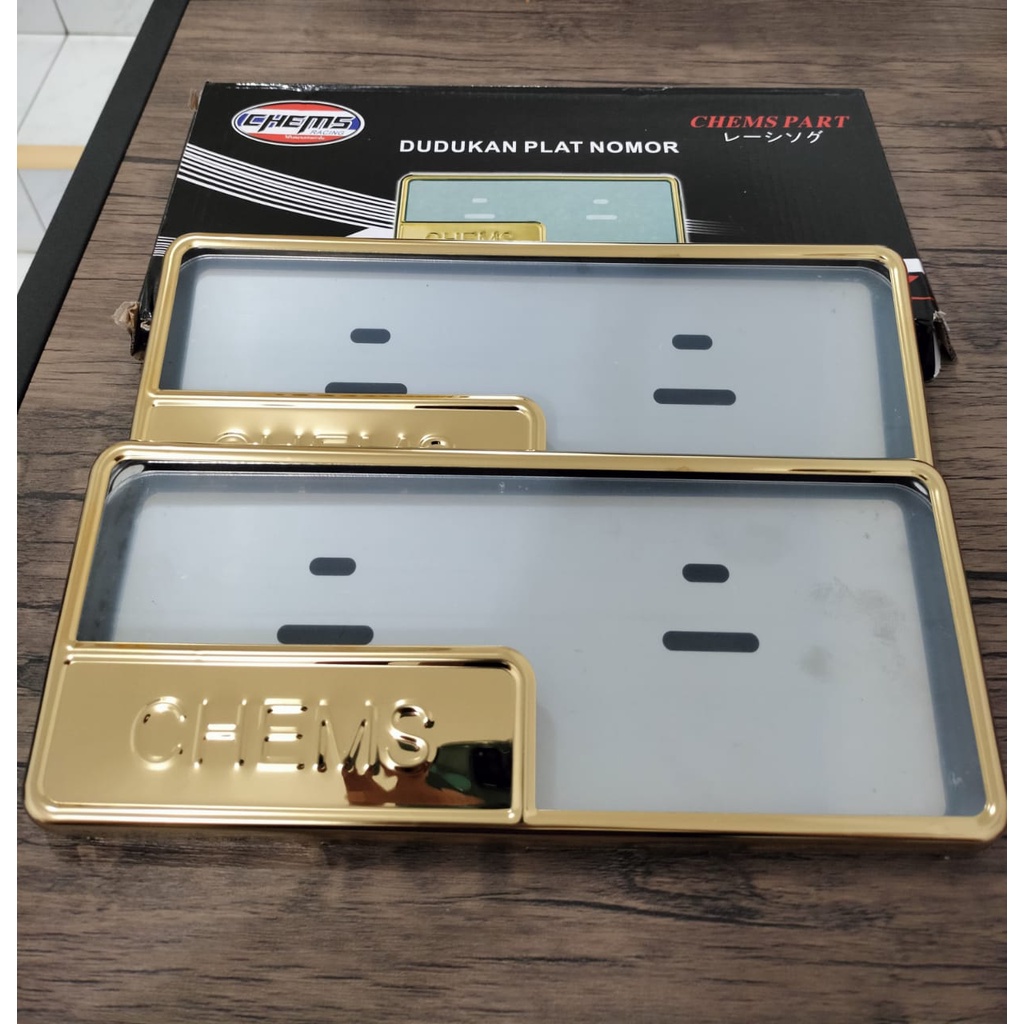 DUDUKAN/BINGKAI/COVER PLAT NOMOR GOLD CHEMS TIMBUL SEMUA JENIS MOTOR