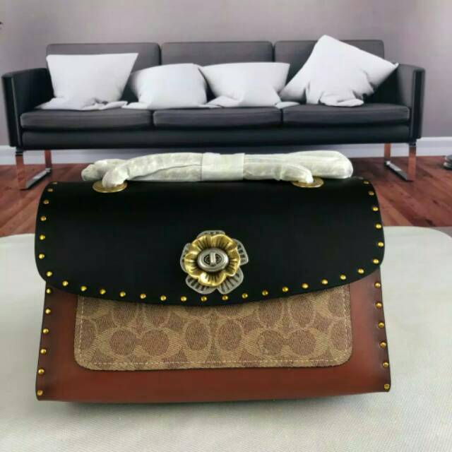 Tas Coach Bag Parker with rivets and snake skin