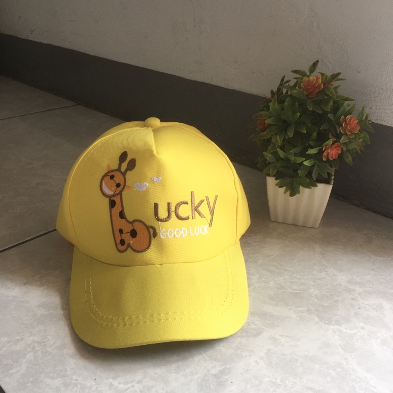 Topi anak jerapah ucky kuning