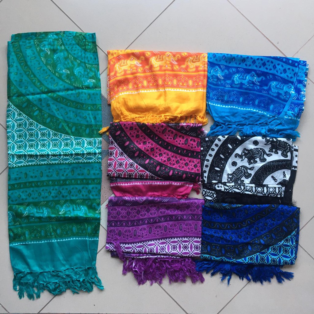 Pakaian wanita kamen kain sarung pantai bali motif gajah kecil oleh oleh khas bali souvenir bali