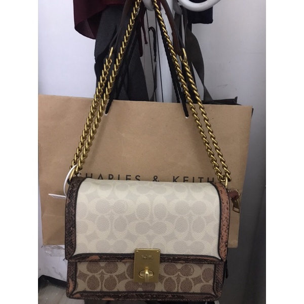 coach hutton snake bag