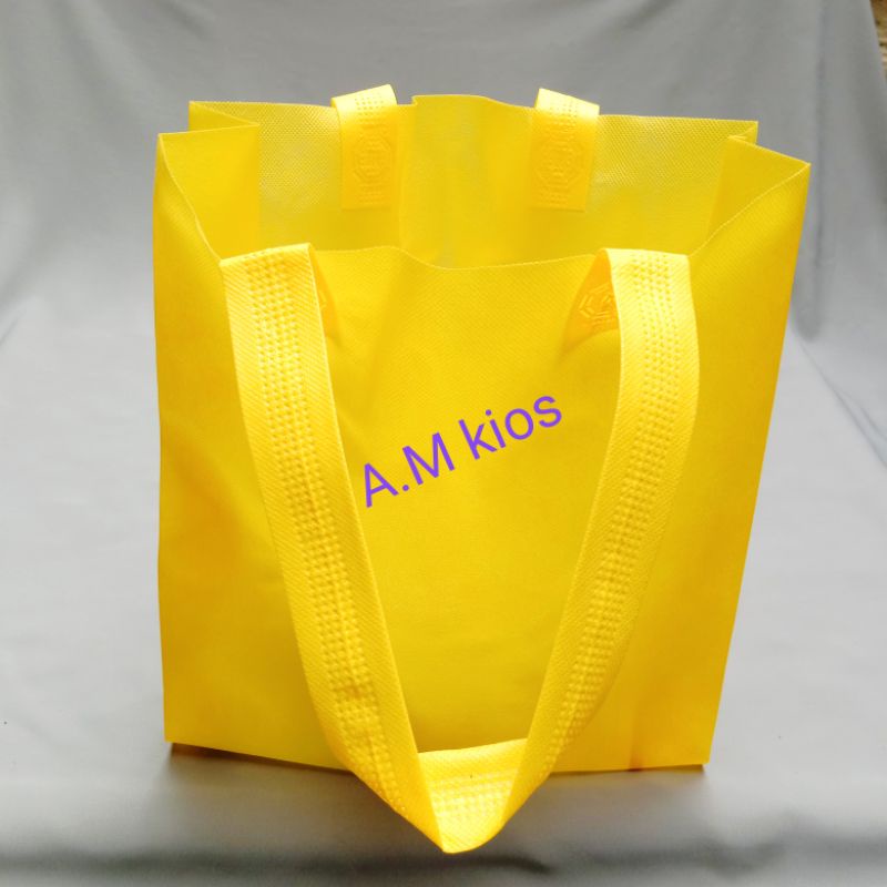

Tas kain polos, Goodie bag [ECER], tas Spunbond polos Uk 38x45x10 cm, tas handle lipat samping