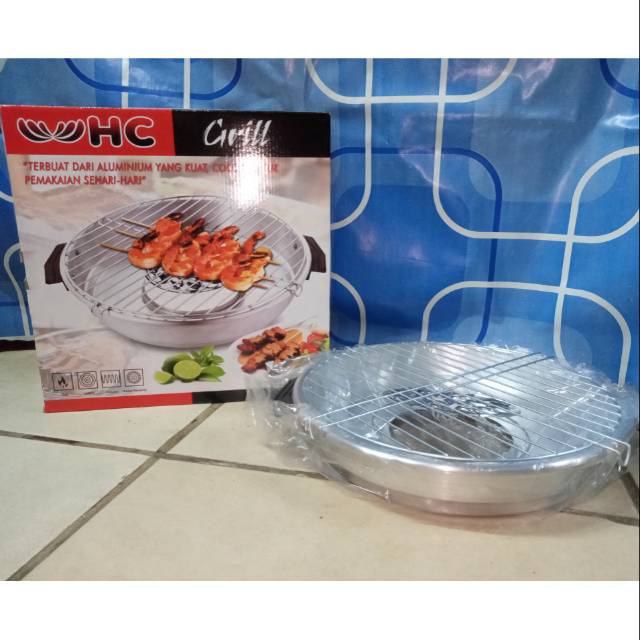 Panggangan atau bakaran sosis / ayam merk happy call