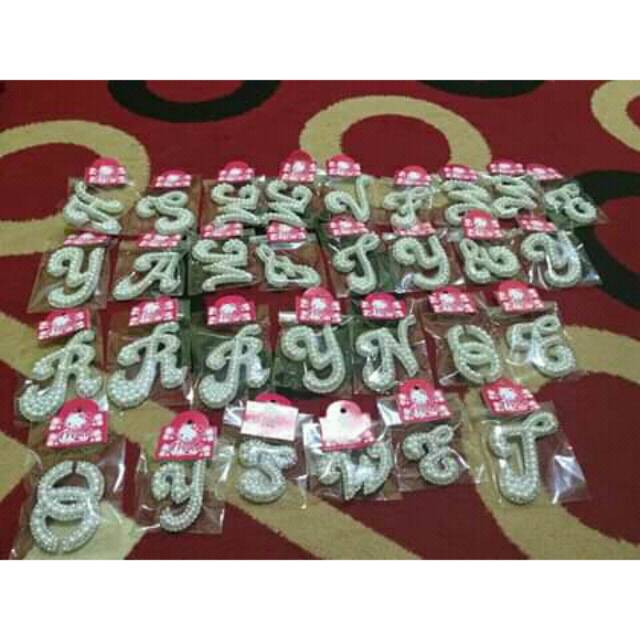 Bros insial huruf mutiara