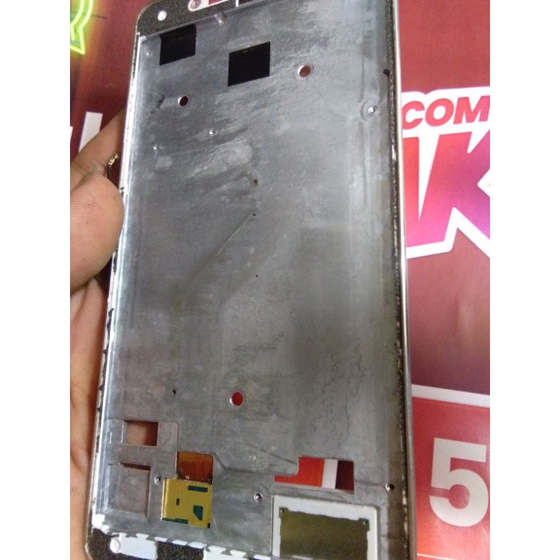 tulangan tatakan fram lcd haier l7 lite normal