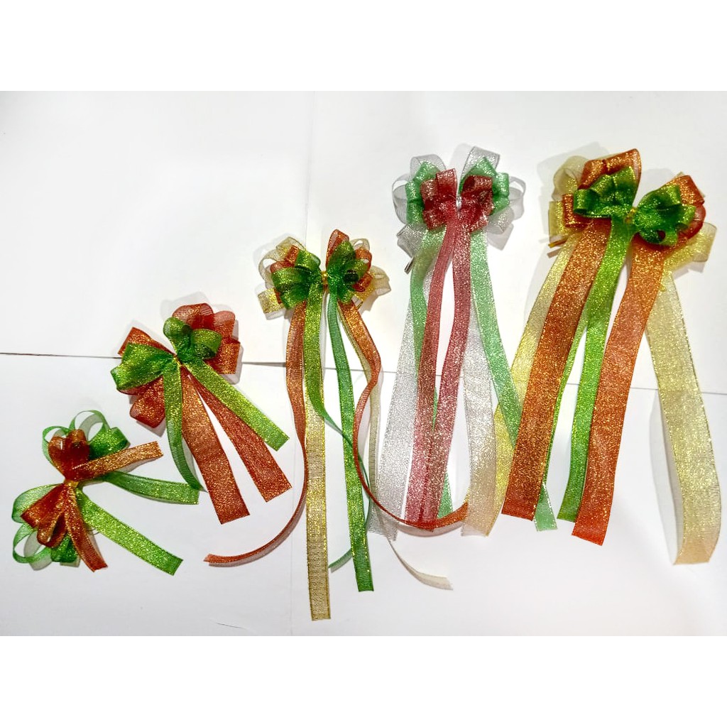 

Pita Jadi Natal Glitter Surai