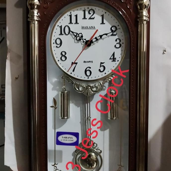 Jam dinding sakana Bandul Besar music tersedia stok
