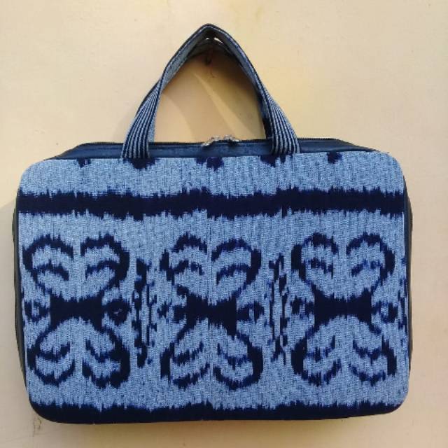 Tas laptop tenun troso