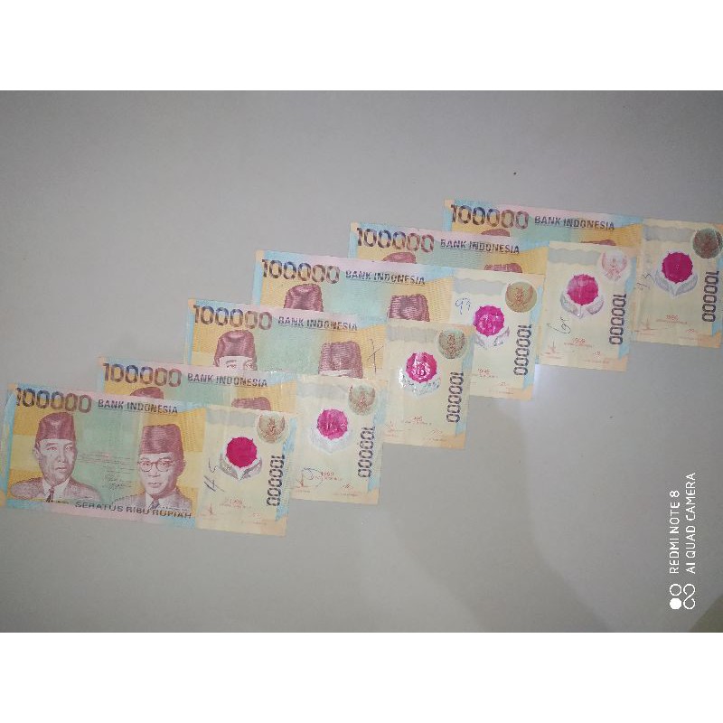 uang kuno Rp 100.000 polimer tahun 1999 minus ada coretan