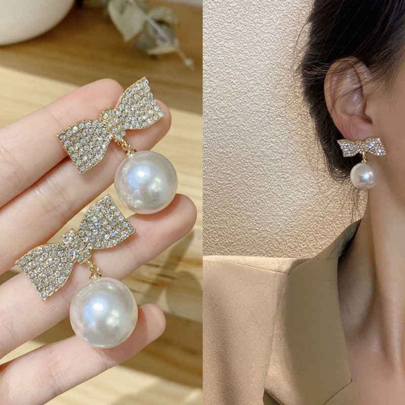 Anting Tusuk Gantung Desain Pita Hias Mutiara + Berlian Gaya Korea Untuk Wanita