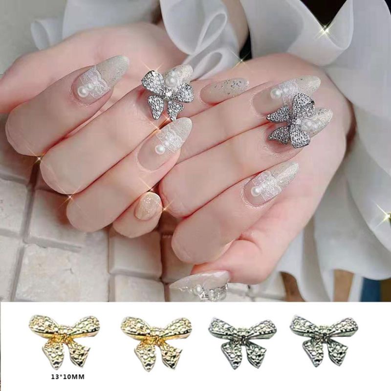 Charm nail pita / Nail bow white colour