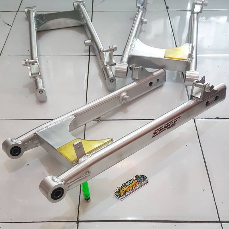 swing arm dkt supra125 kirana karisma supra110 jupiter grend legenda