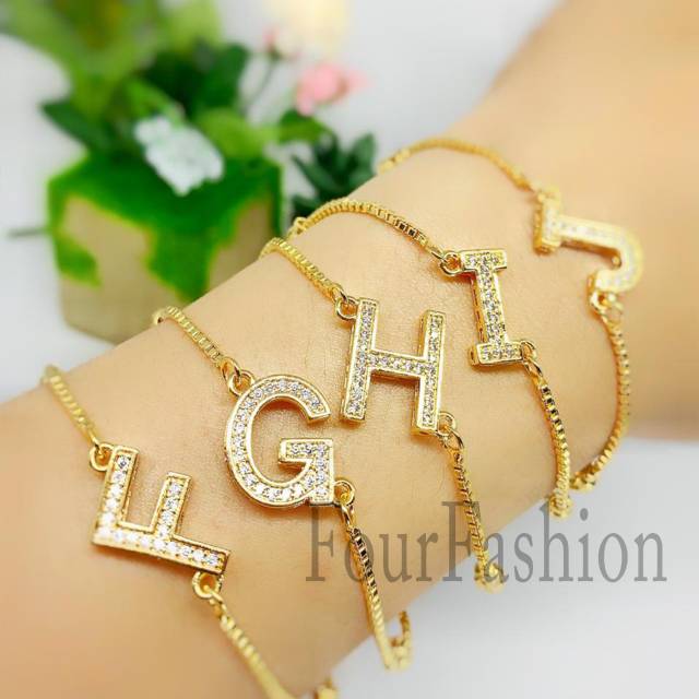 Fourfashion - Gelang tangan Sirkon ARIAL Huruf Capital Xuping GOLD