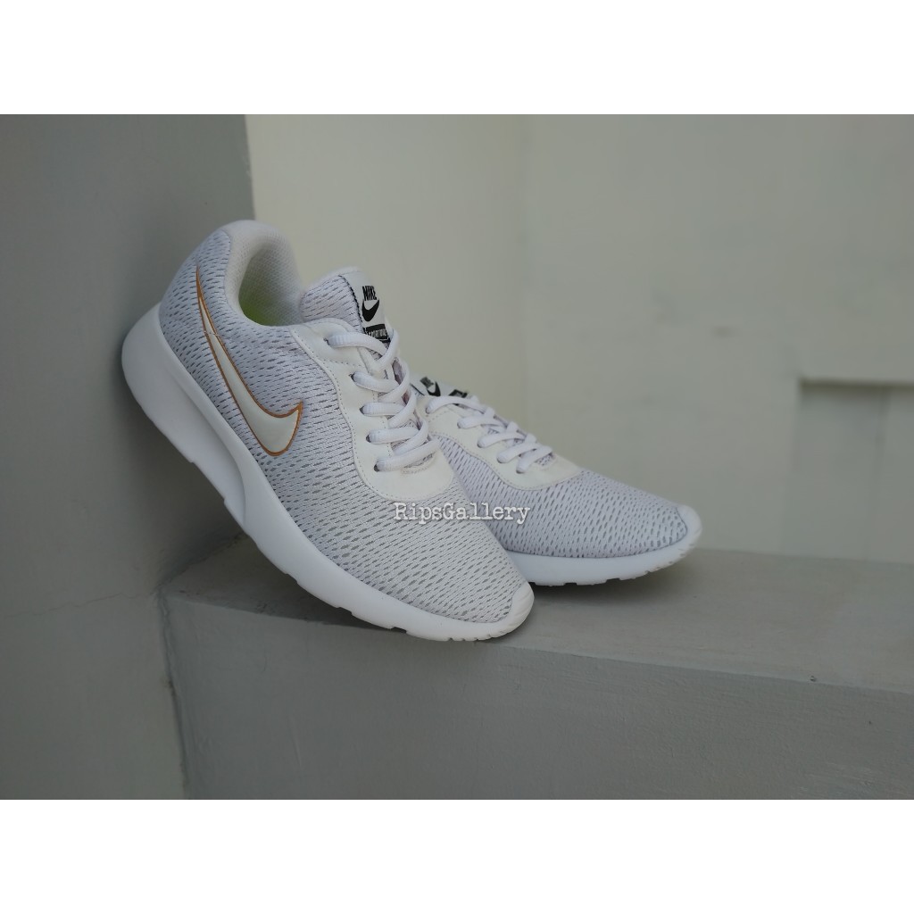 white mesh nike trainers