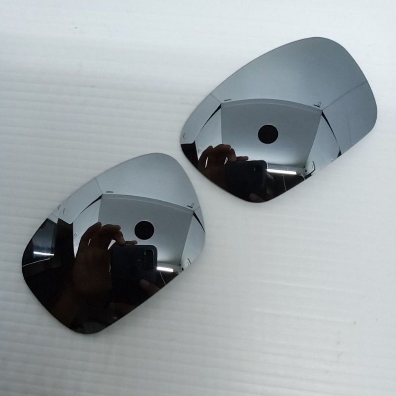 Oakley badman silver titanium polarized lens