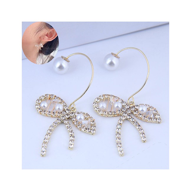 LRC Anting Tusuk Fashion Golden Pearl Earrings With Diamond Bow A60376