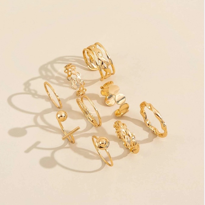 9pcs / Set Cincin Model Twist Hollow Warna Emas Gaya Vintage Untuk Wanita