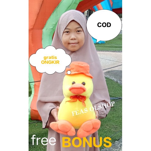 Boneka bebek kuning viral lucu besar bertopi lembut empuk menggemaskan