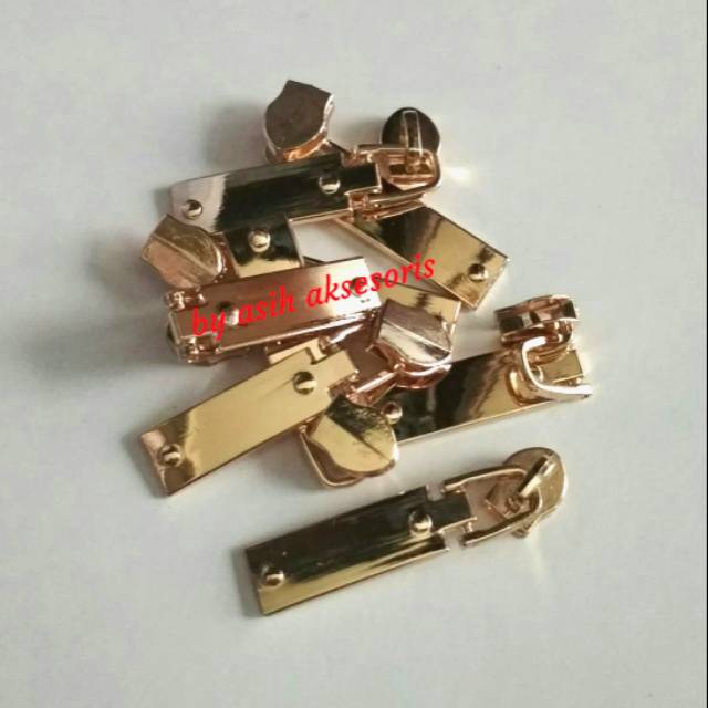 Kepala resleting no.5 plastik mas muda/116