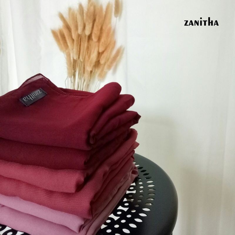 Hijab Aini / Potton Square