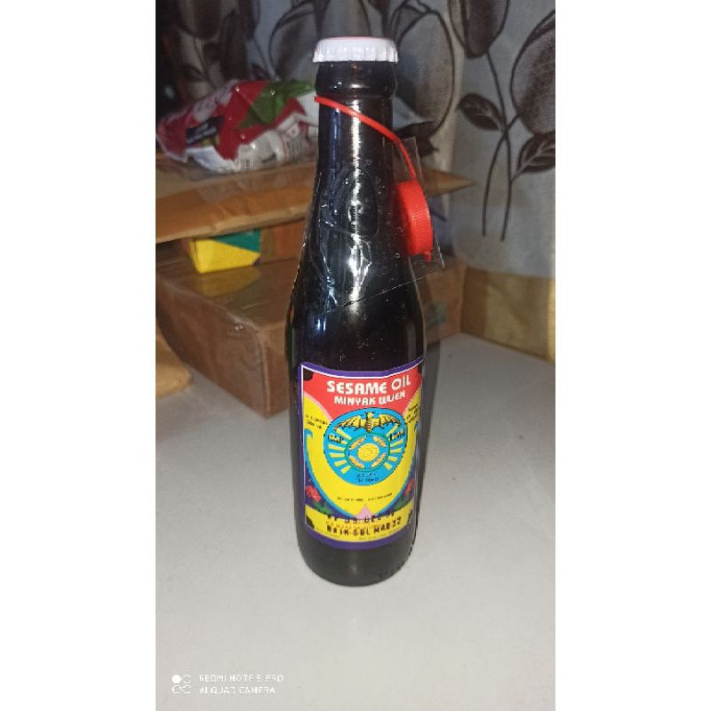 

( cek stok) Minyak Wijen Lowo 300ml / sesame oil / seasoning / cap lowo bahagia