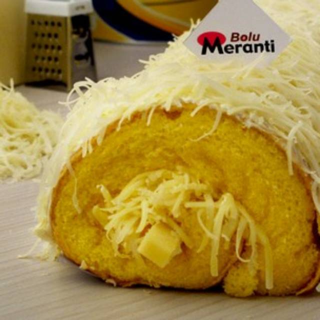 

Bolu meranti topping keju