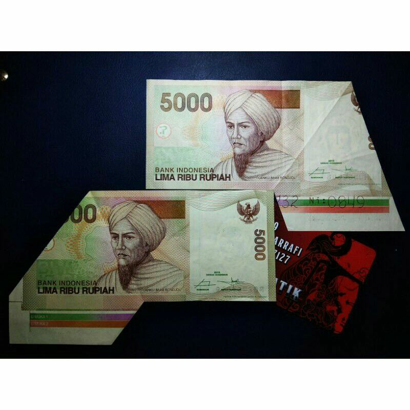 uang misscut uang salah potong uang unik