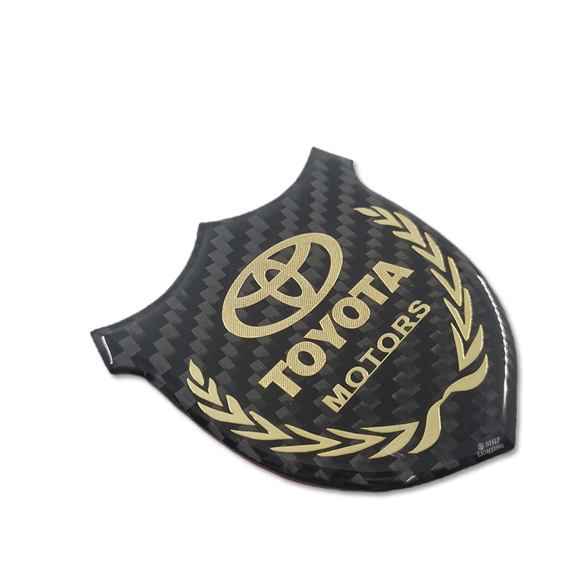 1pc Stiker Emblem Logo TOYOTA MOTORS Bahan Karbon Fiber Untuk Dekorasi Jendela Samping Mobil