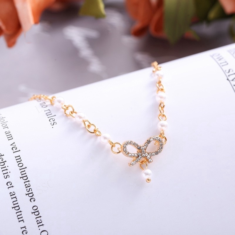 Gelang Korea Fashion Busur Mutiara Hias Berlian imitasi Bangle Liar