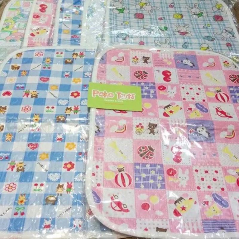 Perlak Pangku 40×35cm / Alas Ompol Bayi / Perlak Traveling Bayi Perlengkapan Bayi