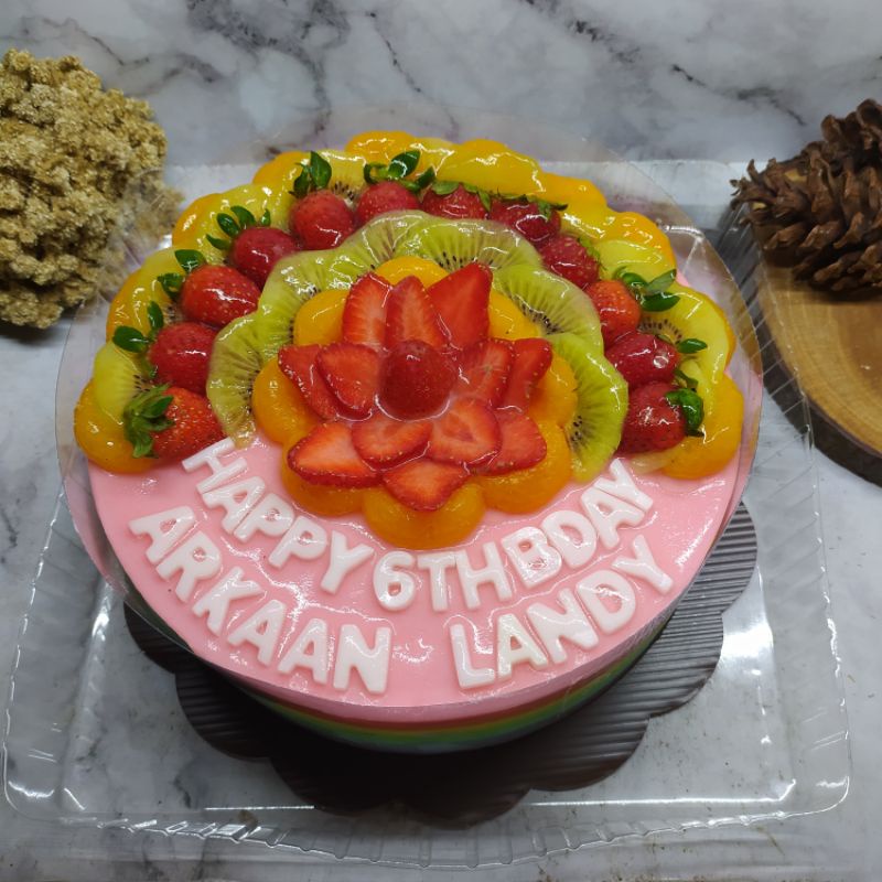 

Puding Ulang Tahun Topping Half Buah 22cm Vanilla Rainbow