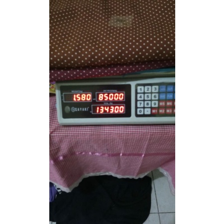 Kain Shakila Motif Kiloan