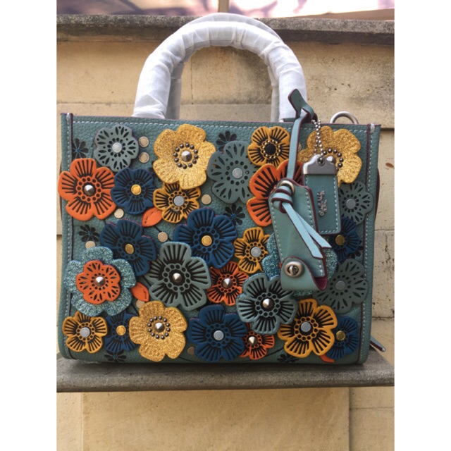 Coach rogue tea rose tosca