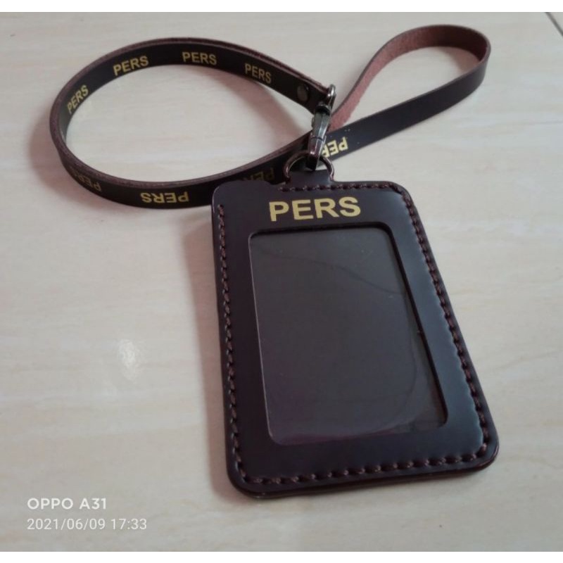 

Kalung Id Card Logo Pers Warna Cokelat